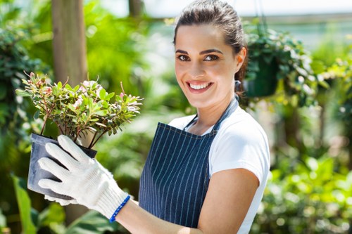Gardener wearing personal protective equipment while working