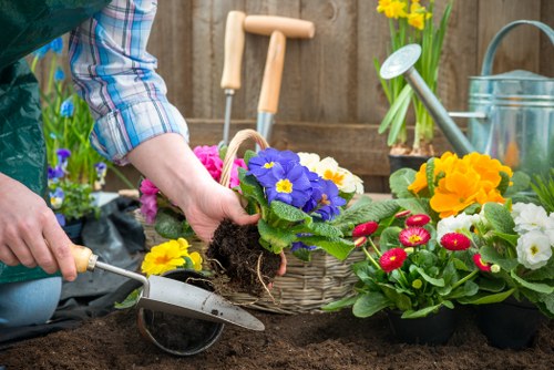 Document folder labelled 'Complaints' beside gardening tools